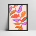 Abstract colorful leaf pattern art print in a black frame