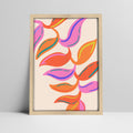 Abstract colorful leaf pattern art print in a light wood frame