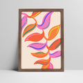 Abstract colorful leaf pattern art print in a dark wood frame