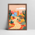 Art print of desert landscape illustration with cacti and house in a dark wood frame