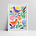 Folk art birds among vibrant flowers print in a white frame