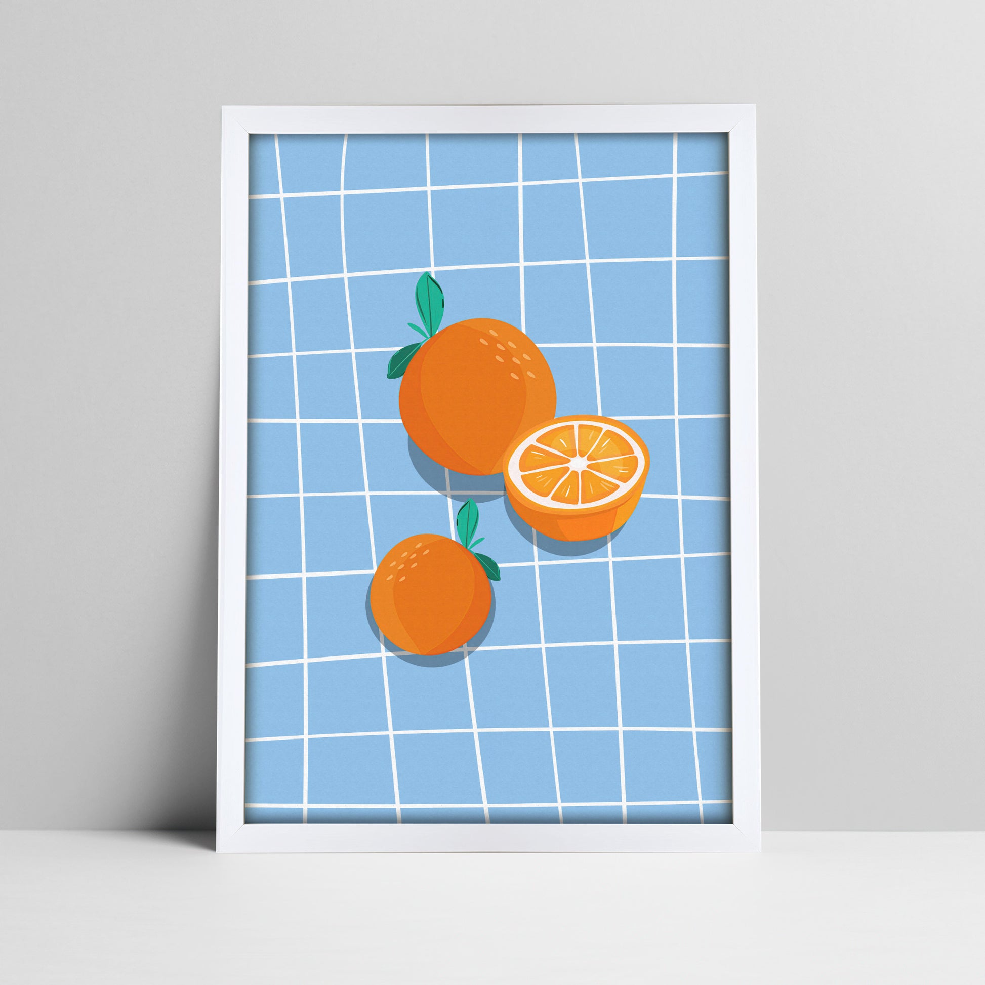 Art print of oranges on blue grid background illustration in a white frame