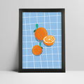 Art print of oranges on blue grid background illustration in a bold black frame