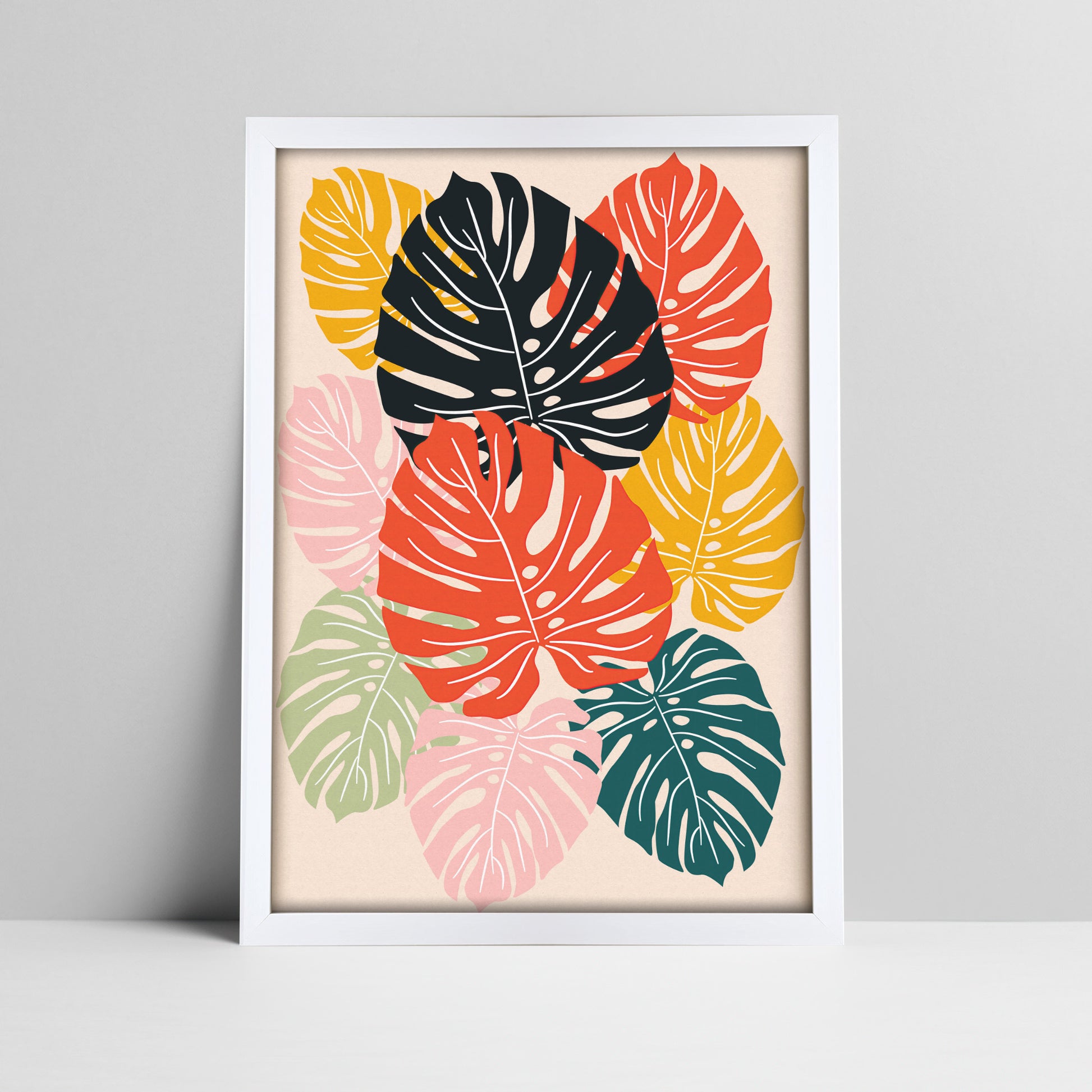 Tropical monstera leaves art print in bold colors in a white frame