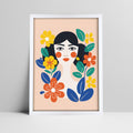 Art print of woman with stylized floral design in a white frame