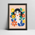 Art print of woman with stylized floral design in a thick black frame